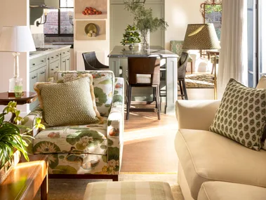 A sunny kitchen and living area.