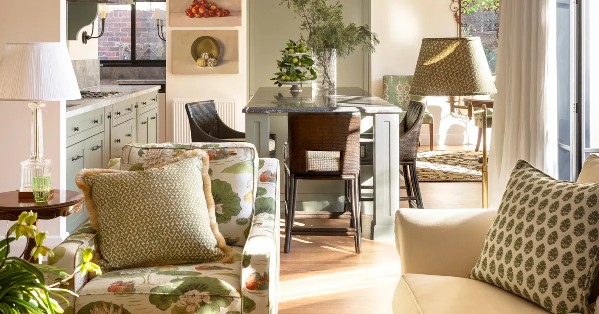 A sunny kitchen and living area.