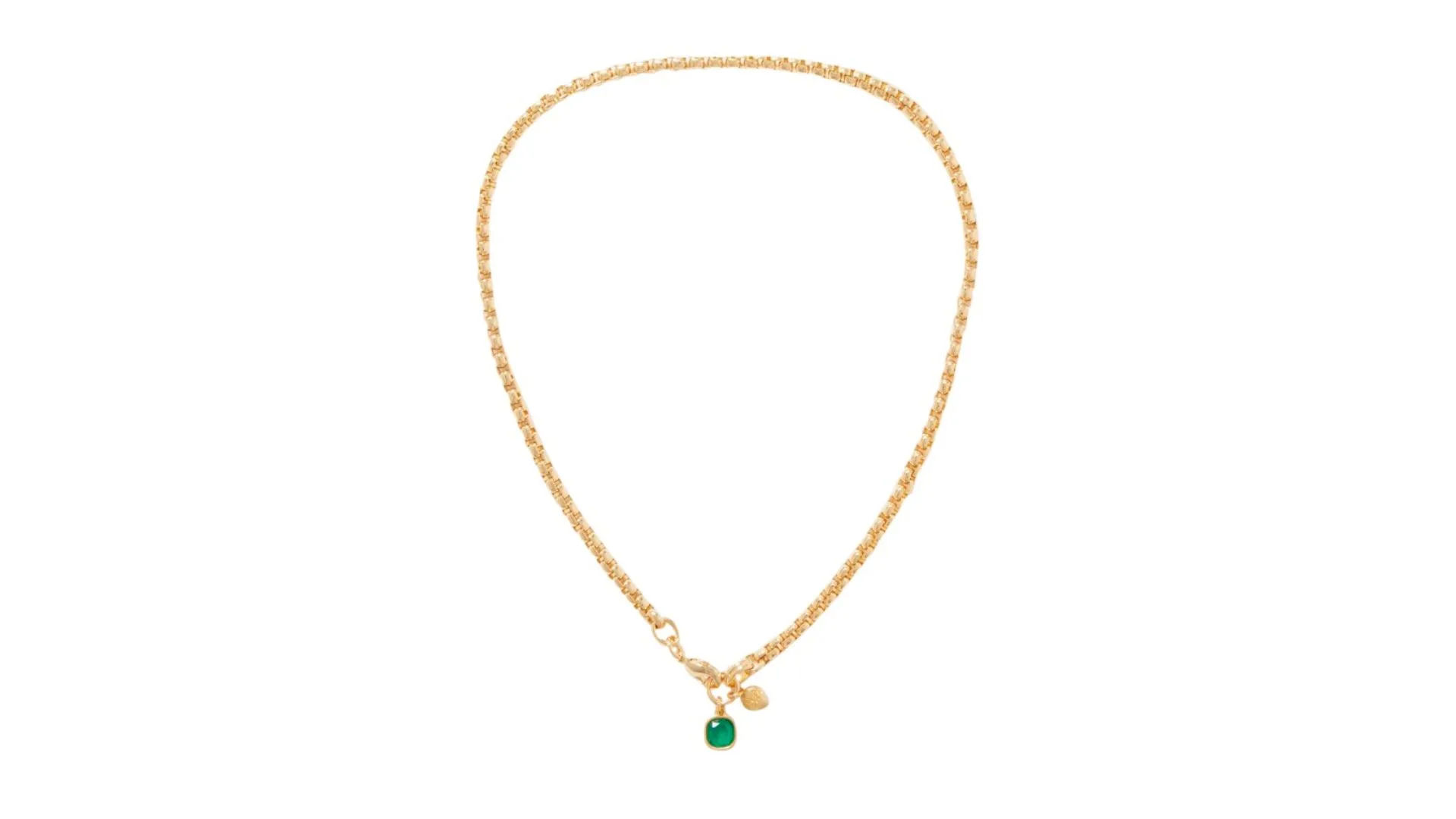 A gold necklace with an emerald pendant