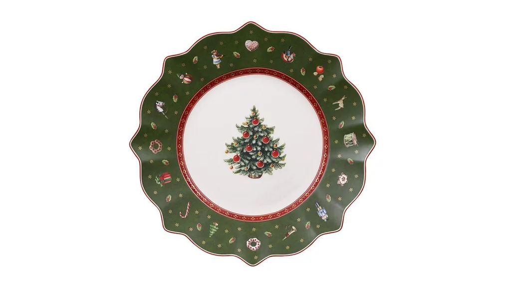 Green plate with an illustration of a Christmas tree in the middle