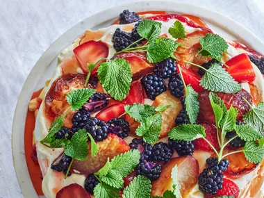 Pavlova with seasonal berries on top at Chiswick restaurant