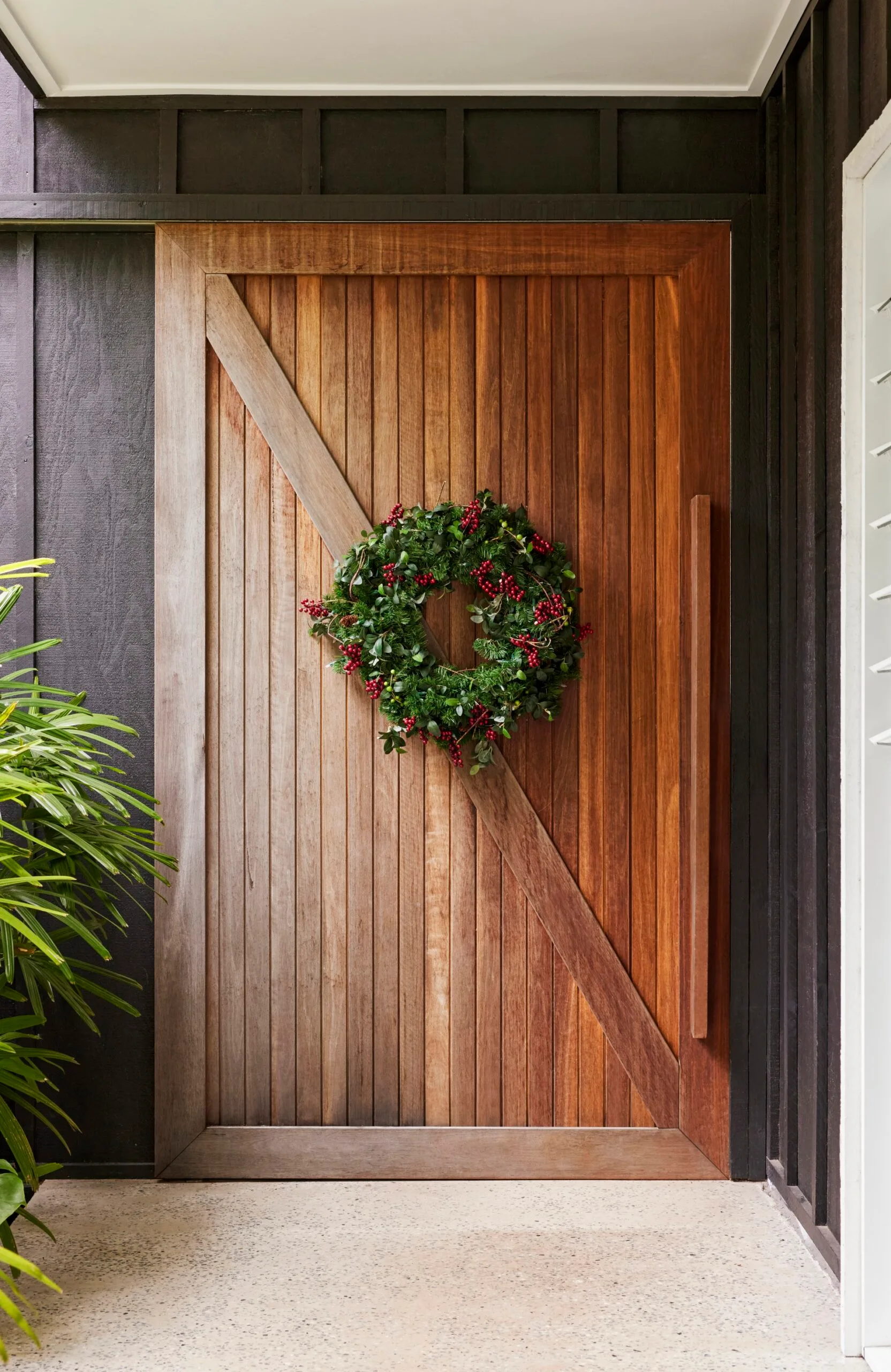 Front door with a wreath. 