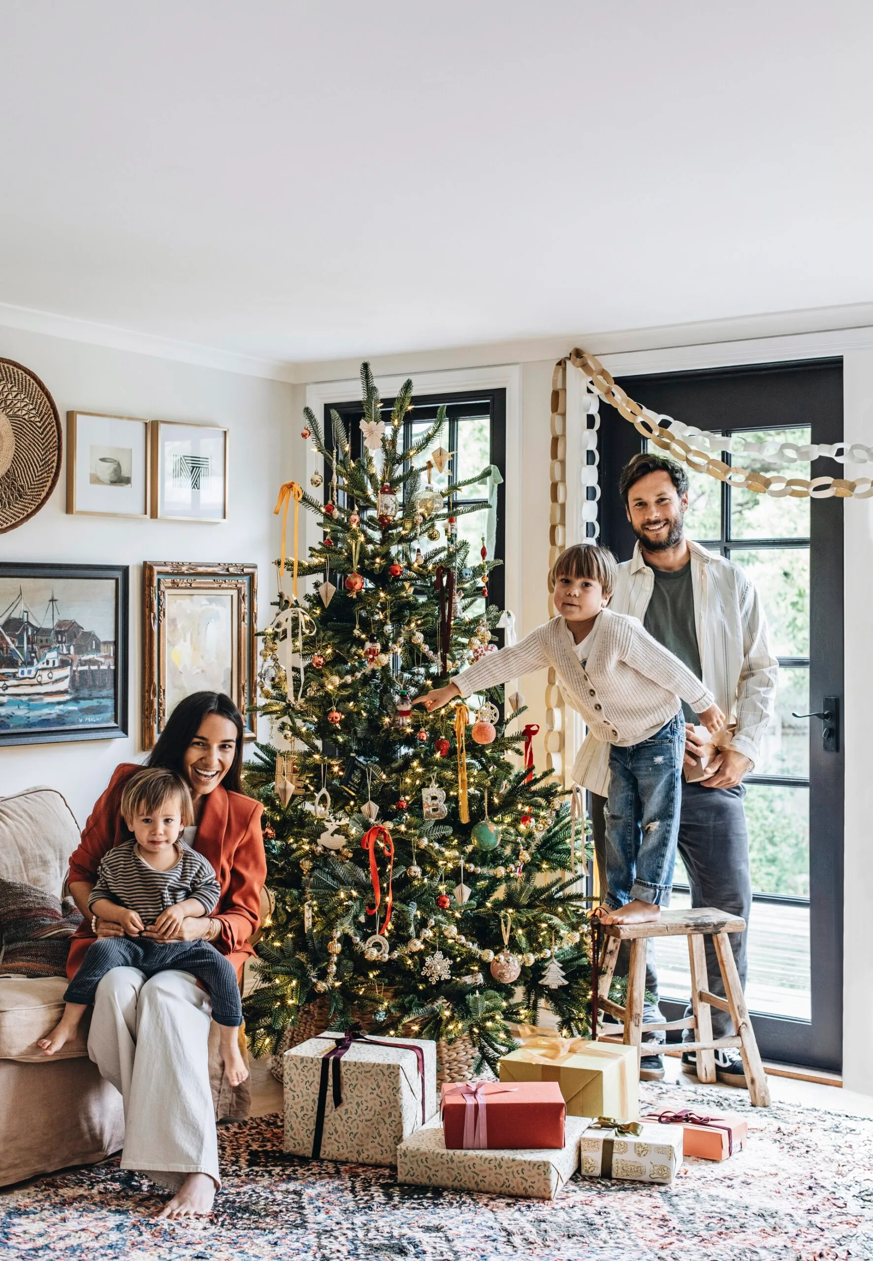 Kayla Gex's family in front of her Christmas tree. 