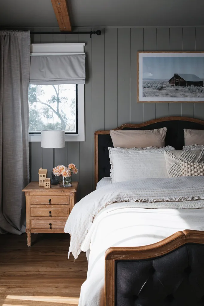 The bed inside a modern farmhouse in Melbourne.
