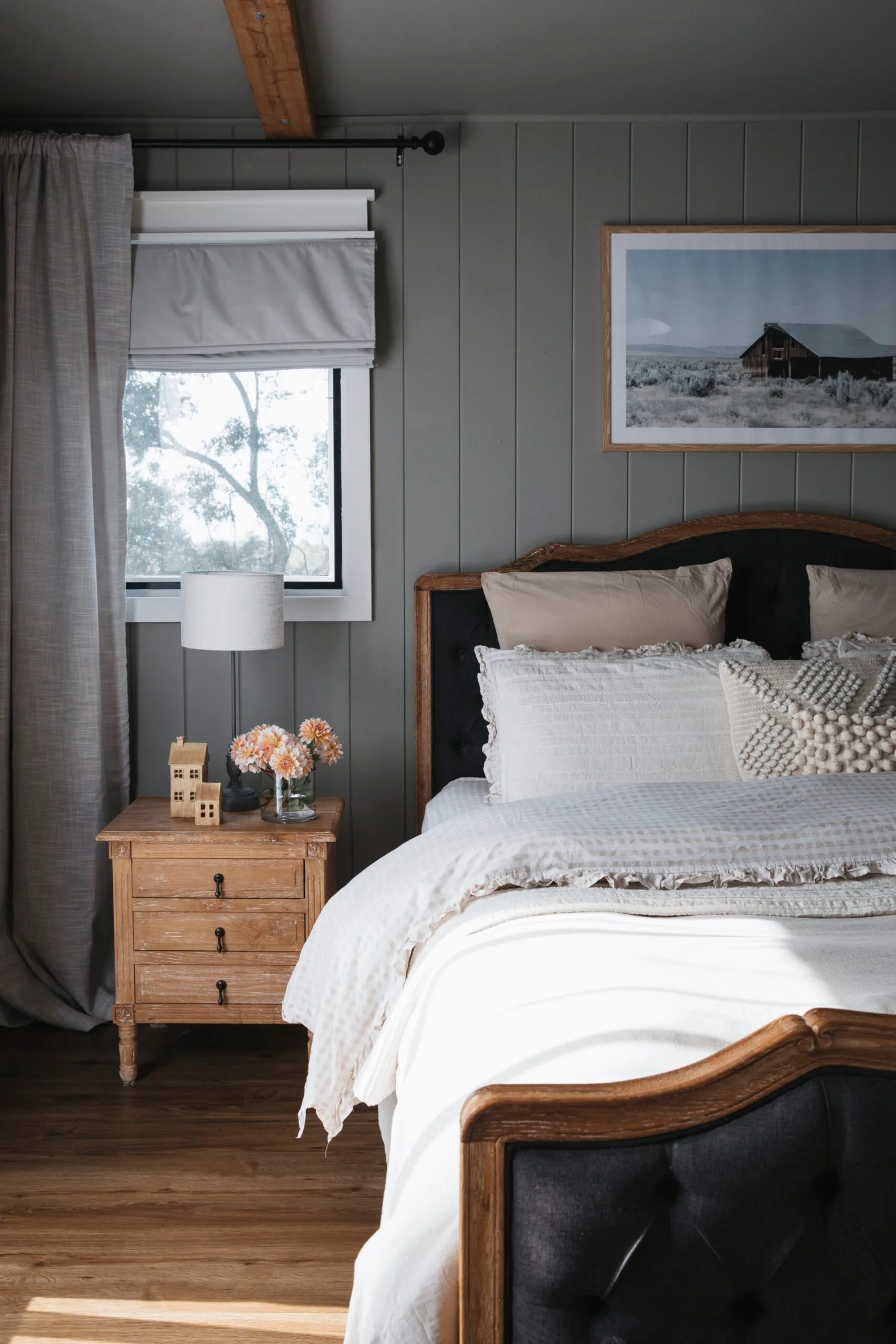 The bed inside a modern farmhouse in Melbourne. 