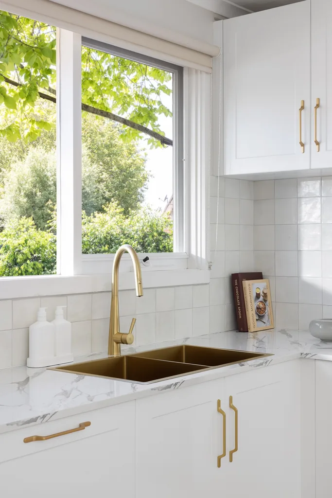 Kitchen renovations for less with white subway tiles for the splashback and flat-pack joinery.