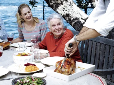 Margaret Fulton's classic French roast chicken recipe served with family