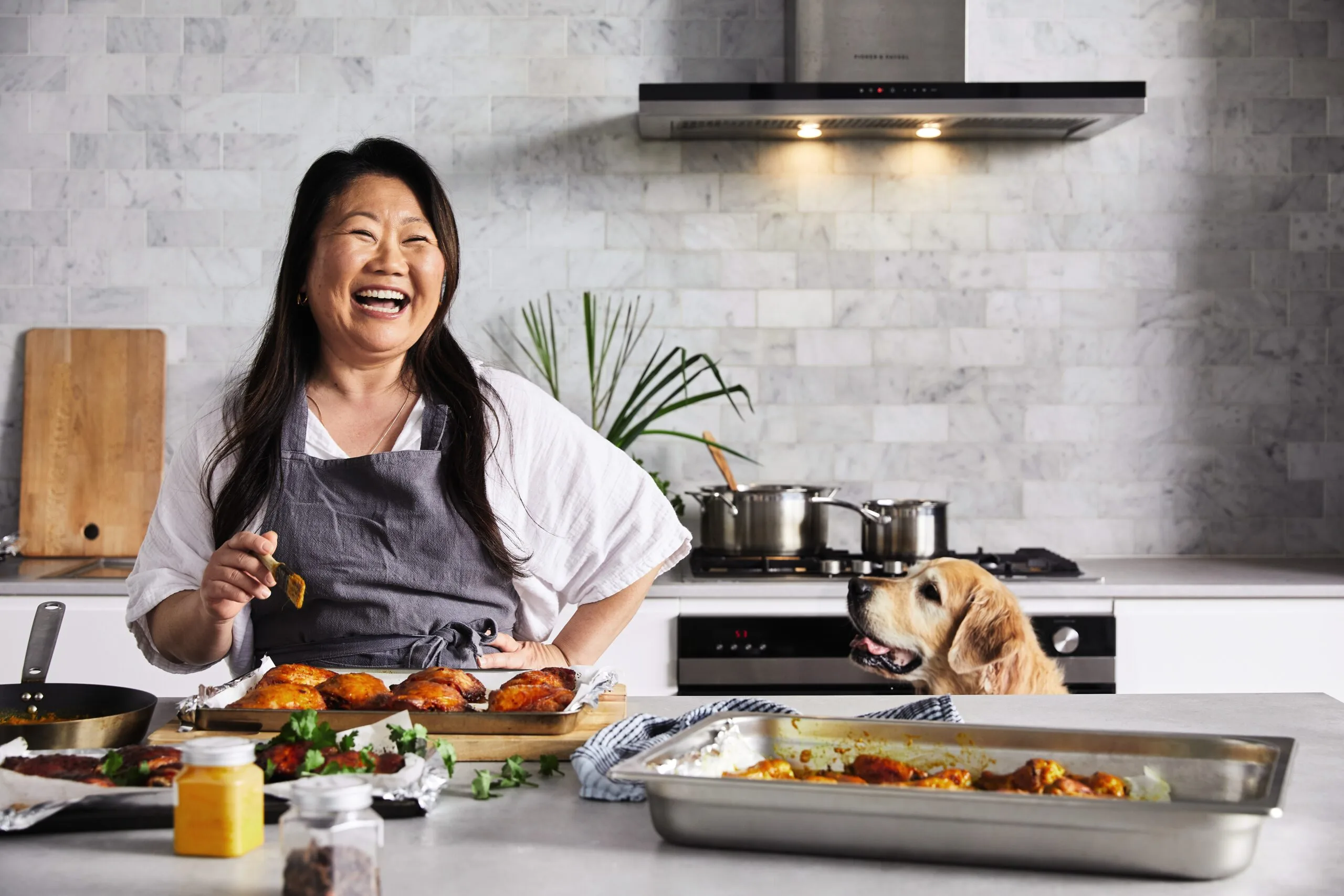 Nagi Maehashi from RecipeTinEats with food in a kitchen