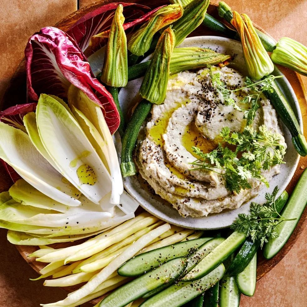 Whipped baba ganoush with Italian-style cruidtes including endives, zucchini flowers, radicchio Treviso and baby cucumbers