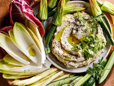 Whipped baba ganoush with Italian-style cruidtes including endives, zucchini flowers, radicchio Treviso and baby cucumbers