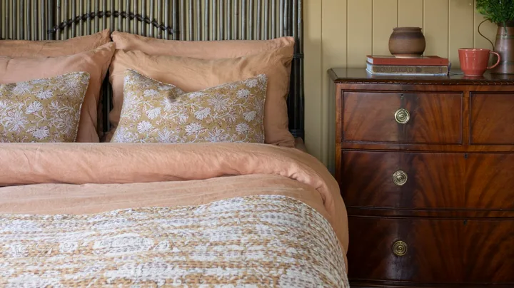 The bedroom inside a century old country cottage.