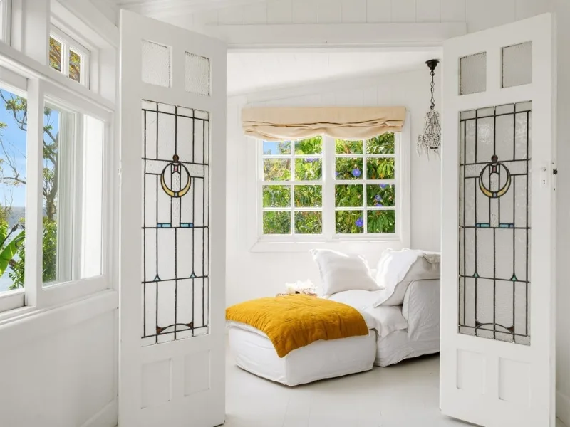Magazine editor Justine Cullen Palm Beach home leadlight windows on French doors