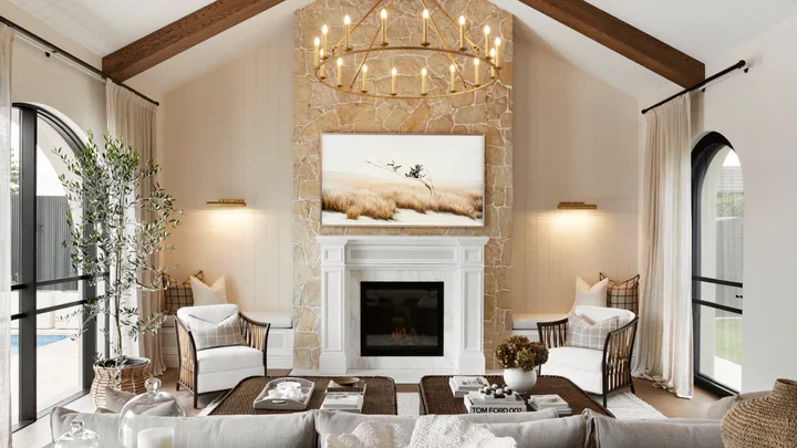 Alisa and Lysandra Brighton bungalow fireplace chandelier stone wall