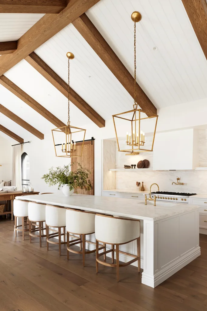 Alisa and Lysandra Brighton bungalow gold pendants exposed beams