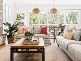 Living room with checkered lounge and wooden coffee table