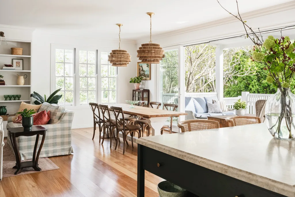 Dining area with two large pendants over table
