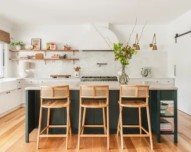 Kitchen with three stools