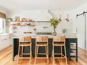 Kitchen with three stools