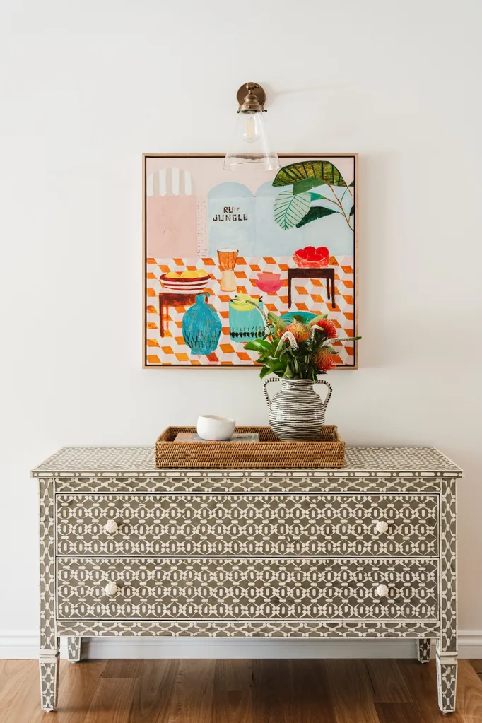 Sideboard with bright art and pattern
