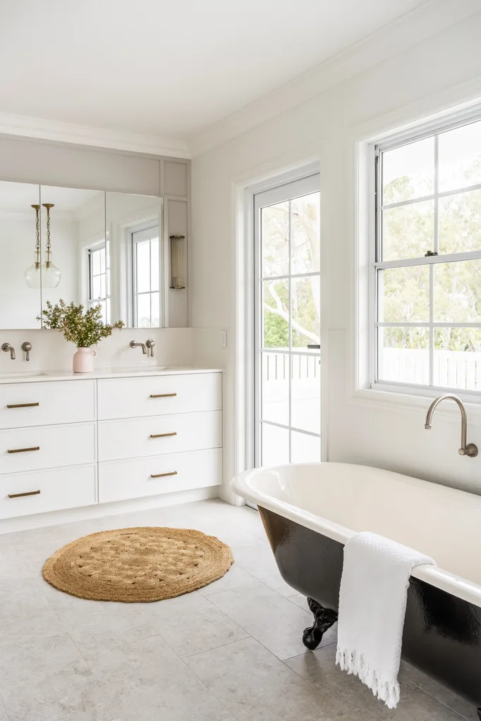 White bathroom with clawfoot tub