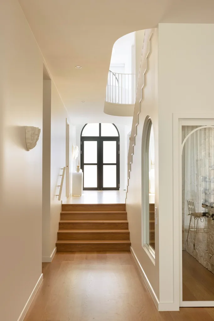 The light-filled entryway of a new build Brisbane home.
