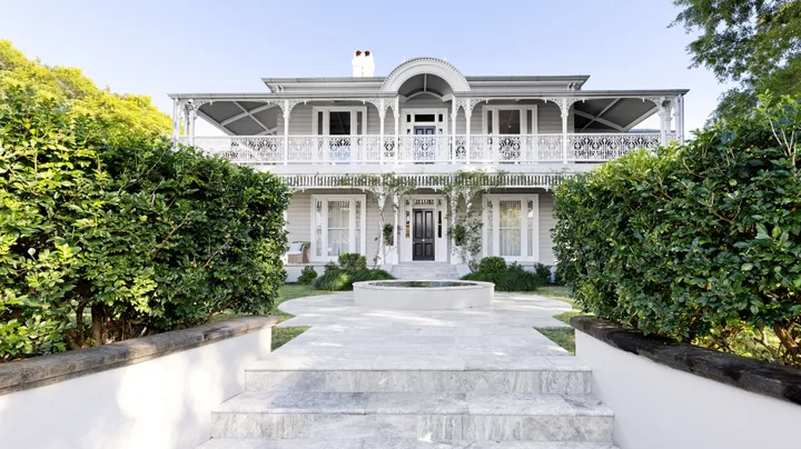 The Victorian exterior of a historical home in Brisbane.