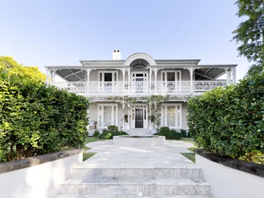 The Victorian exterior of a historical home in Brisbane.