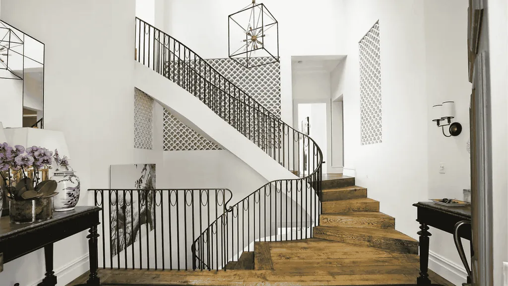 Curved staircase and timber floors in Martine Chippendale's Darling Point home