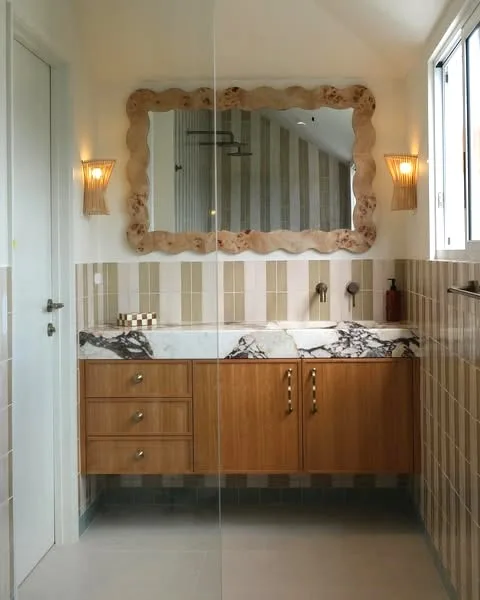 Matty J and Laura Chante Mer House renovation bathroom light