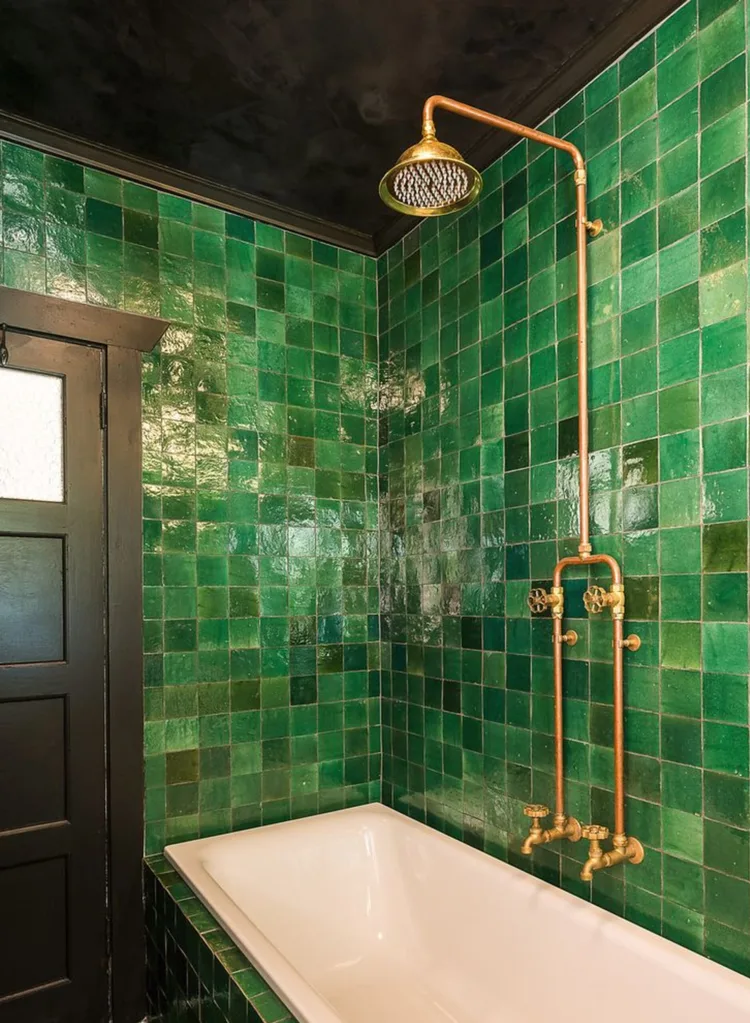The green tiled bathroom in Meg Washington's apartment