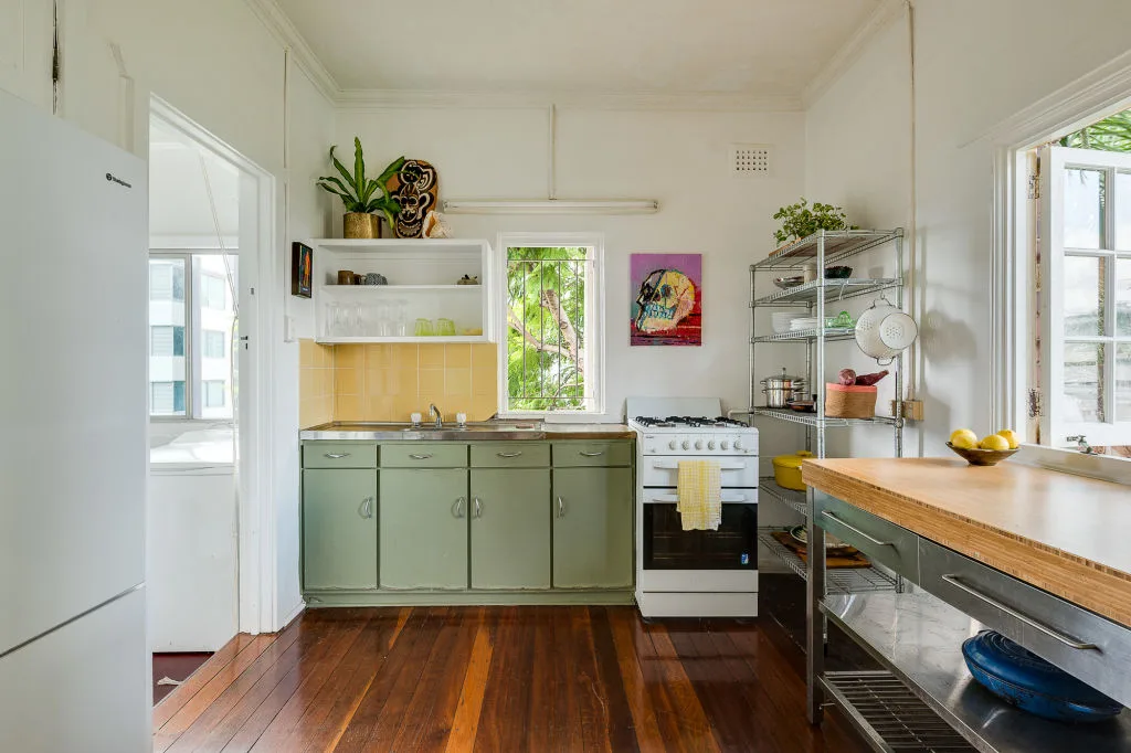 The green kitchen in Meg Washington's apartment