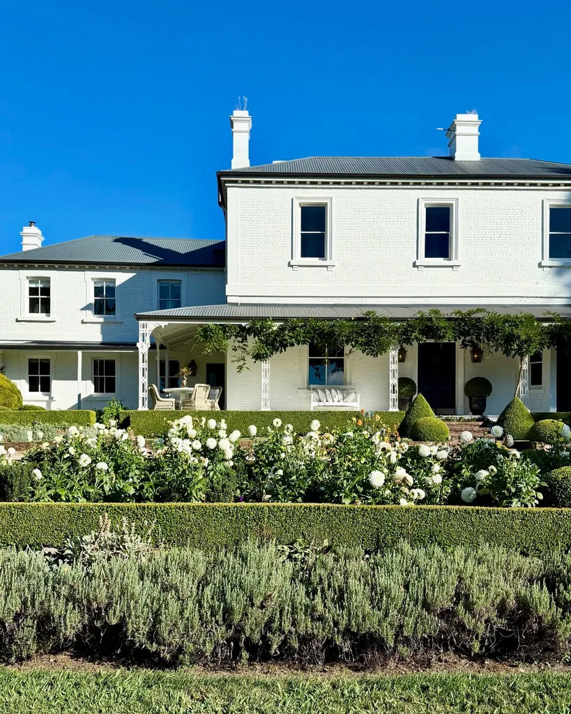 Rosedale Farm with white facade and garden
