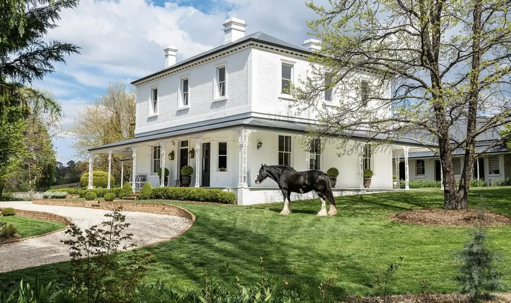 Exterior of Rosedale Farm with a horse