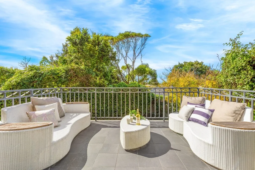 Sally Obermeder's outdoor terrace and white rattan furniture