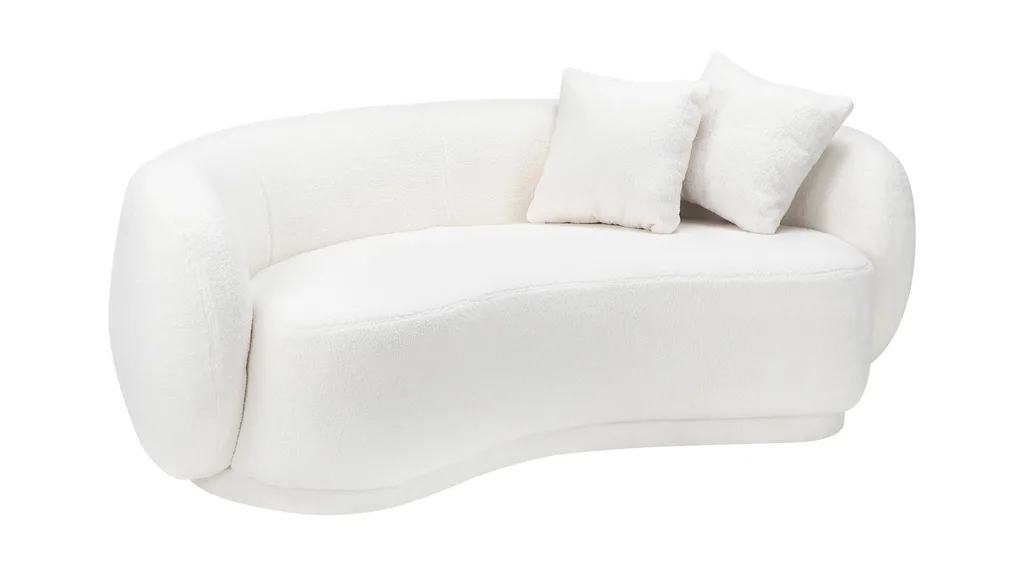 A white curved sofa with boucle fabric from Temple & Webster.