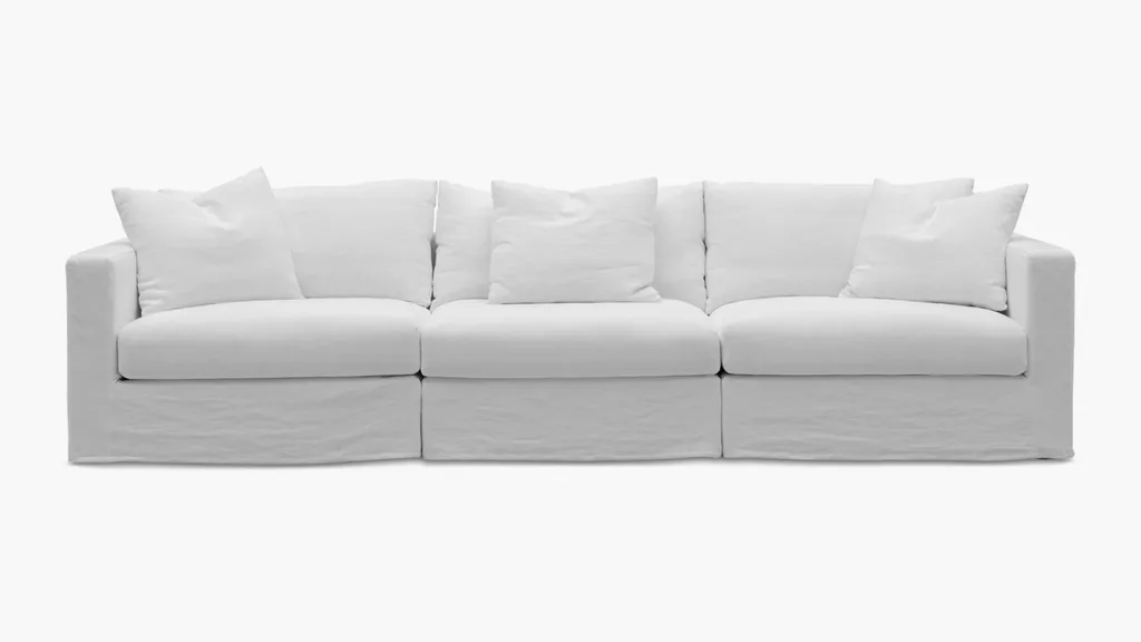 A white sofa with cushions from MCM House.