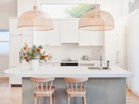 A clever use of light makes this modern cottage kitchen shine