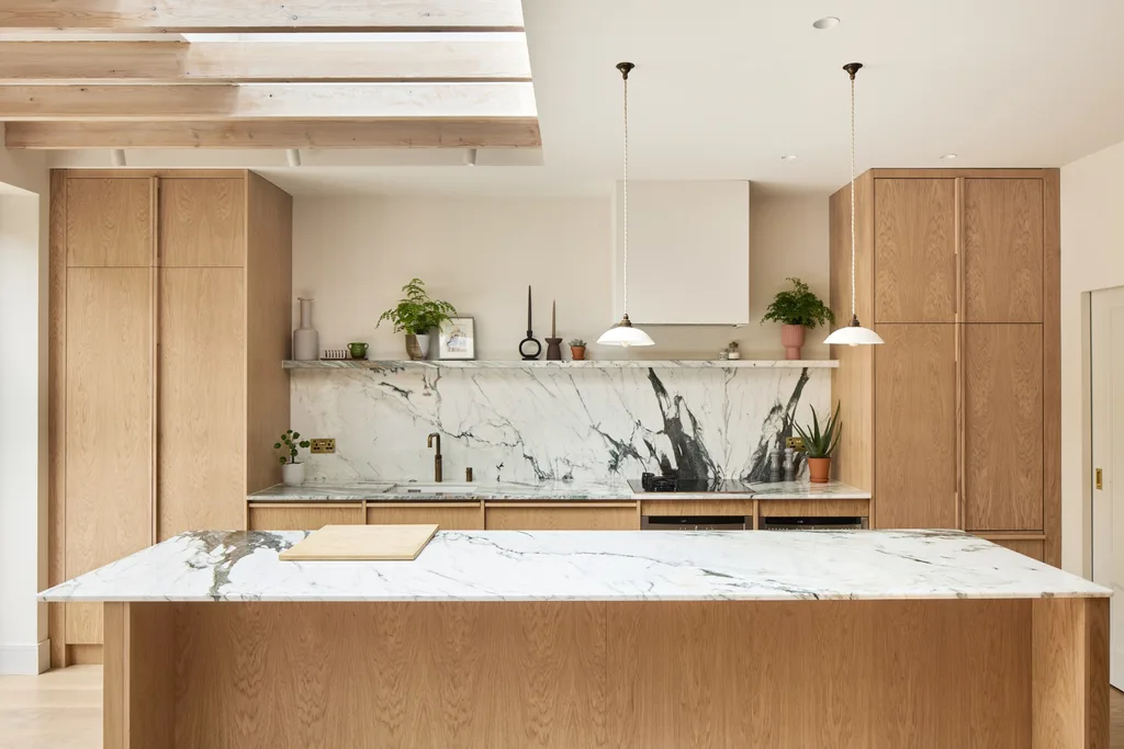 Light timber scandinavian and japanese inspired marble kitchen benchtop and splashback with pendant lights