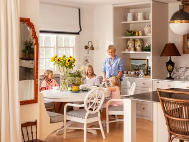 Amy Spargo at dining nook with daughters