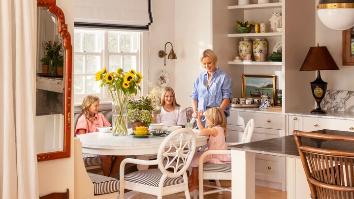 Amy Spargo at dining nook with daughters