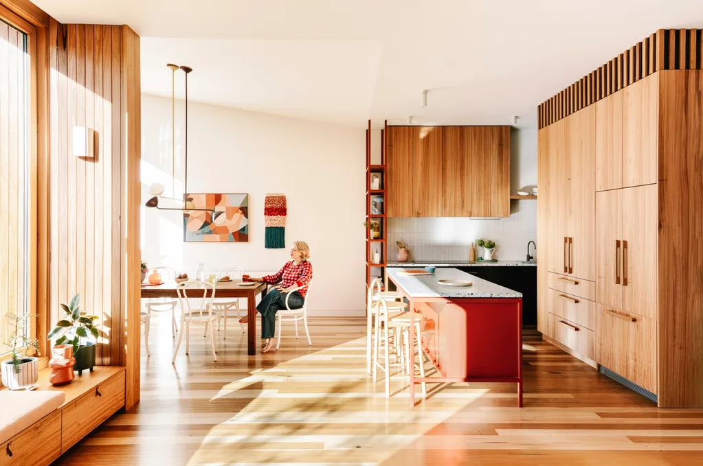 A red kitchen island in a Melbourne home.