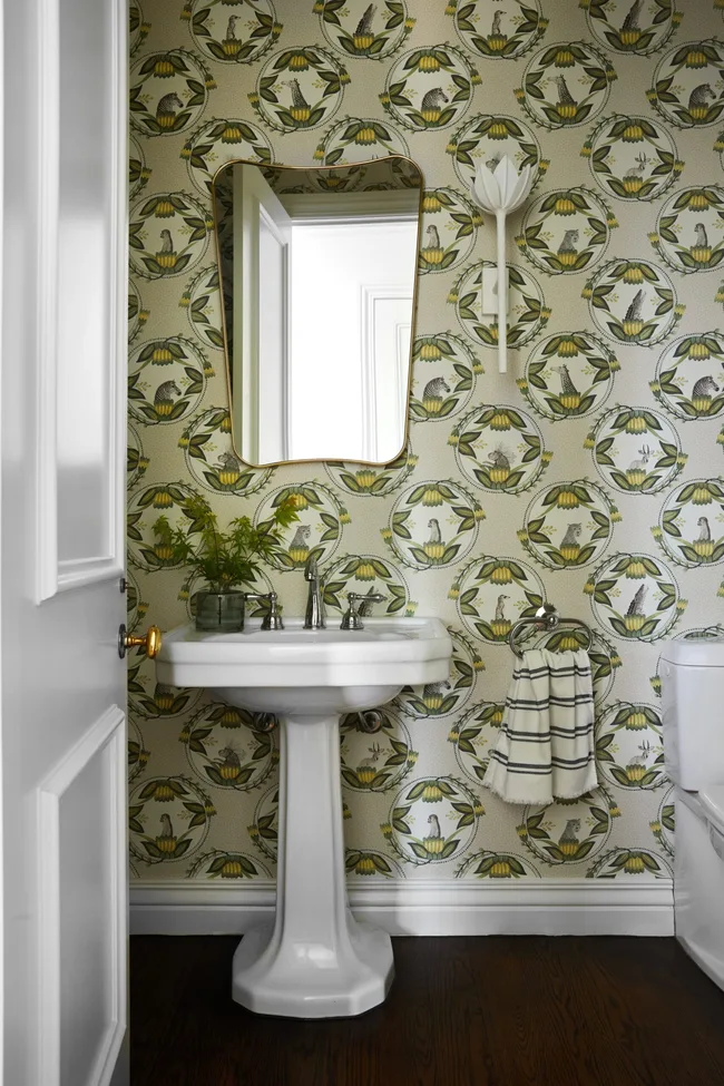A relaxed European style bathroom with a pedestal basin.