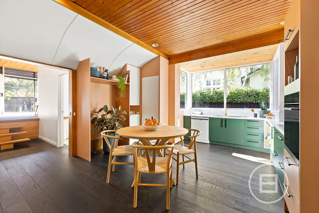 Chrissie Swan mid-century home renovation dining area green kitchen