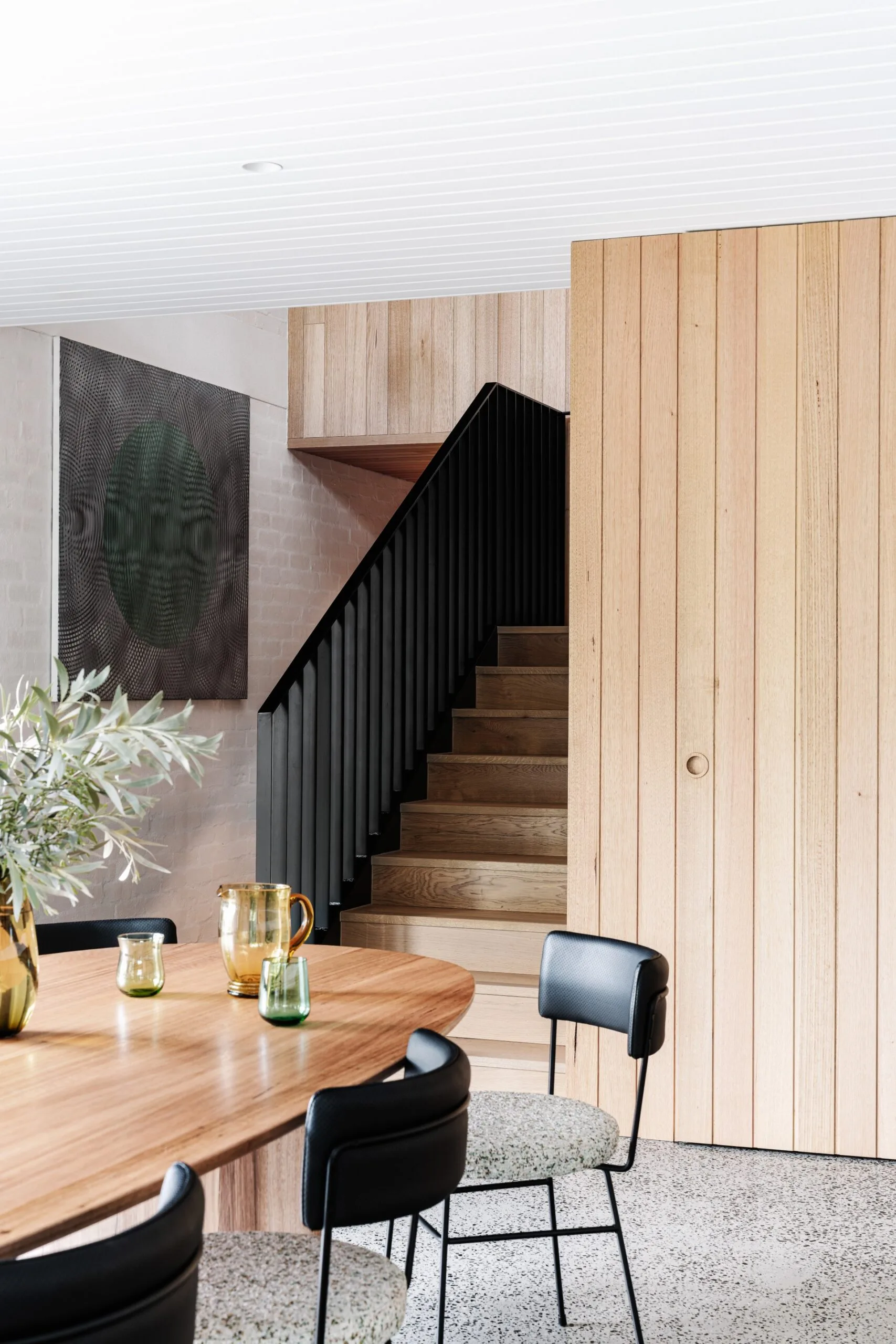 Dining room and timber staircase. 