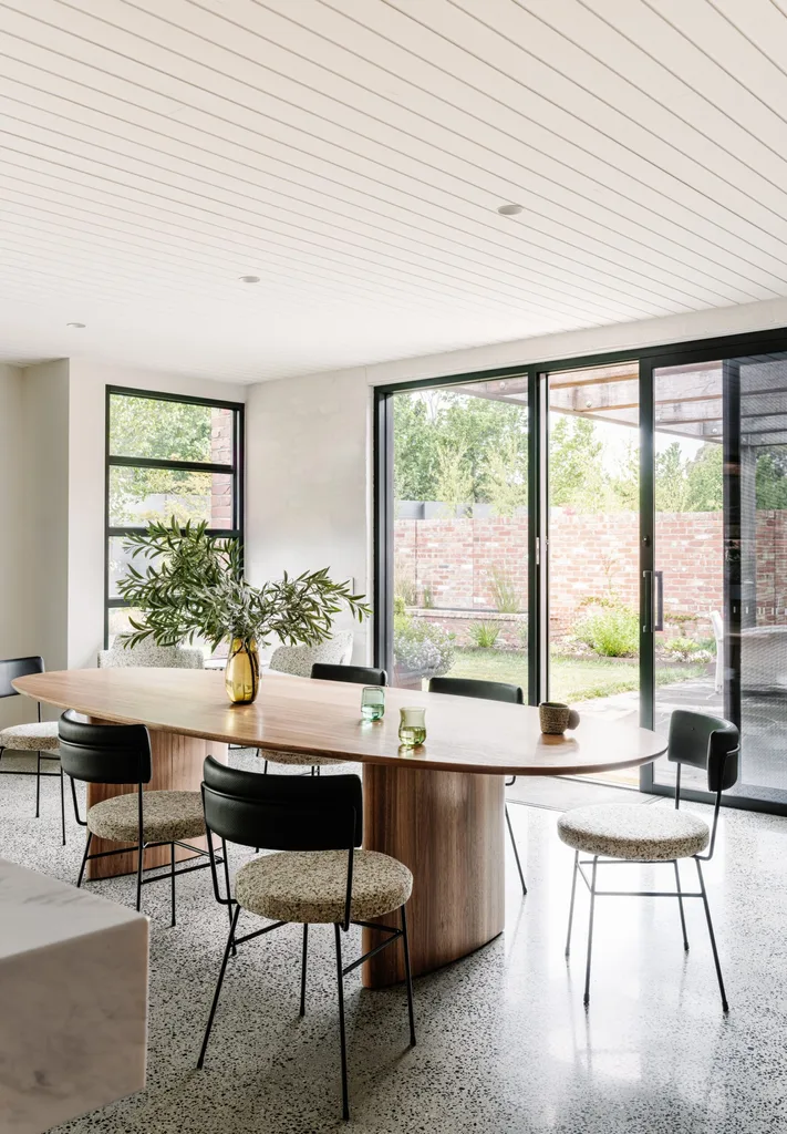 Dining table in light, airy home.