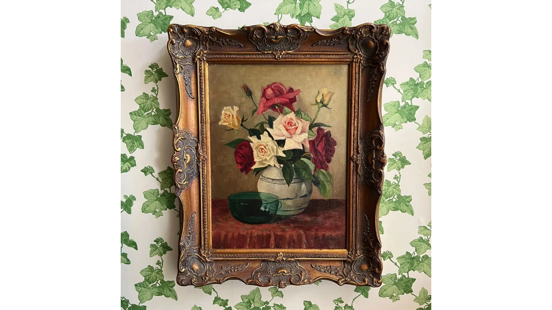 A vintage Dutch painting in a gold frame
