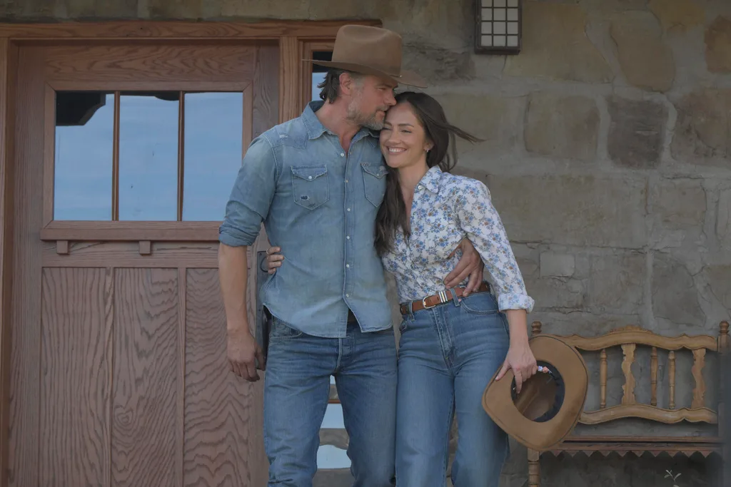 Ransom Canyon Netflix series still with Josh Duhamel and Minka Kelly in front of a stone wall and wooden door
