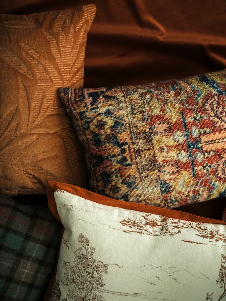 Cosy textured cushions in brown and ochre tones