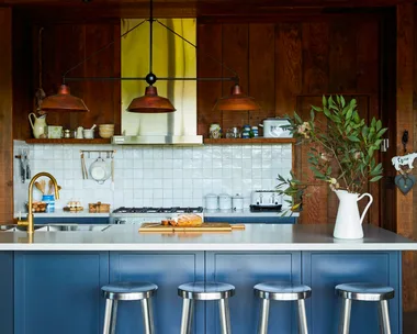 Blue and dark timber farmhouse kitchen