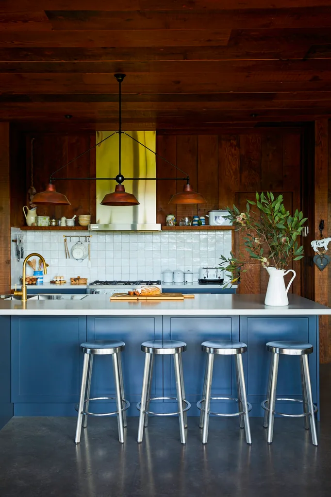 Blue and dark timber kitchen.